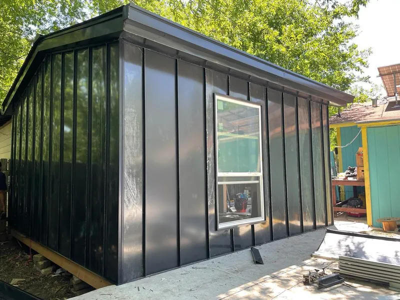 Black standing seam metal wall panels for Roof Inspection in West Springfield