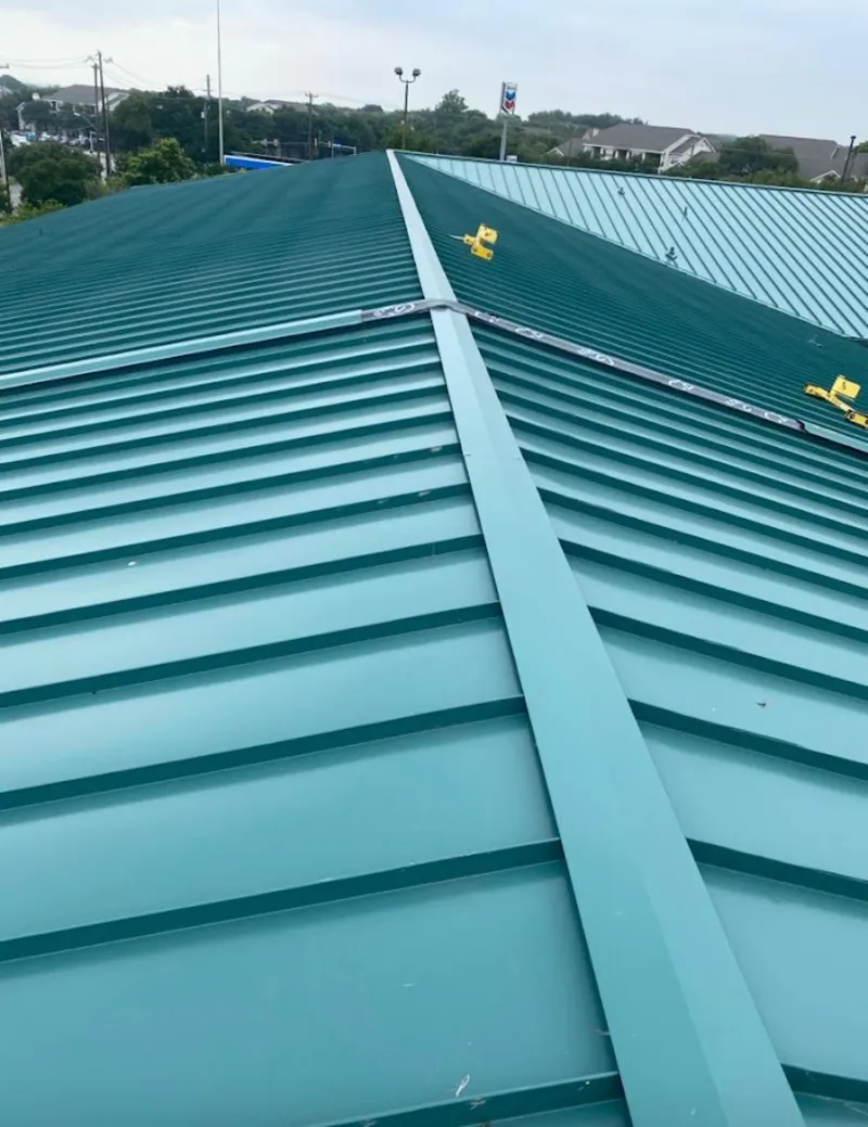 Green commercial metal roof ridge and valley for Metal Roof Repair in West Springfield