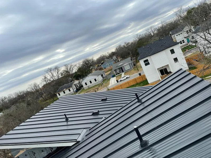 Standing seam metal roof panels with vents for Skylight Repair in West Springfield